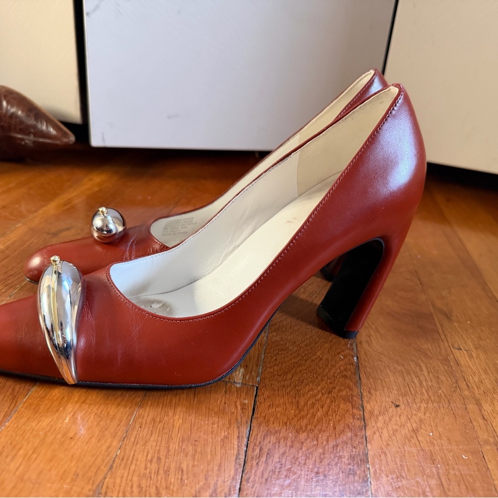 Tory Burch red heels curved with pierced Silver Accent